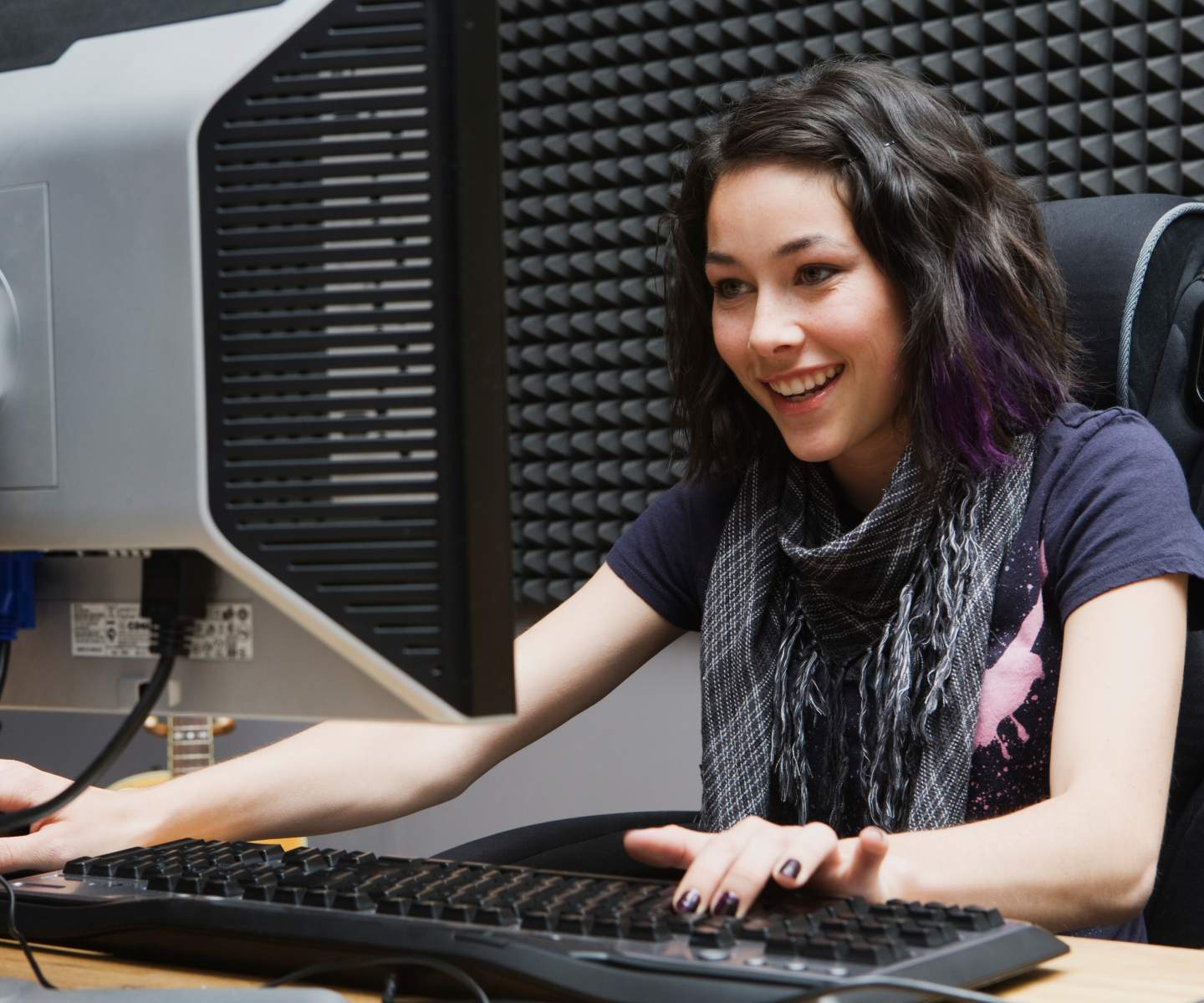 Woman Gaming on Computer using Frontier Fiber 5 gig internet